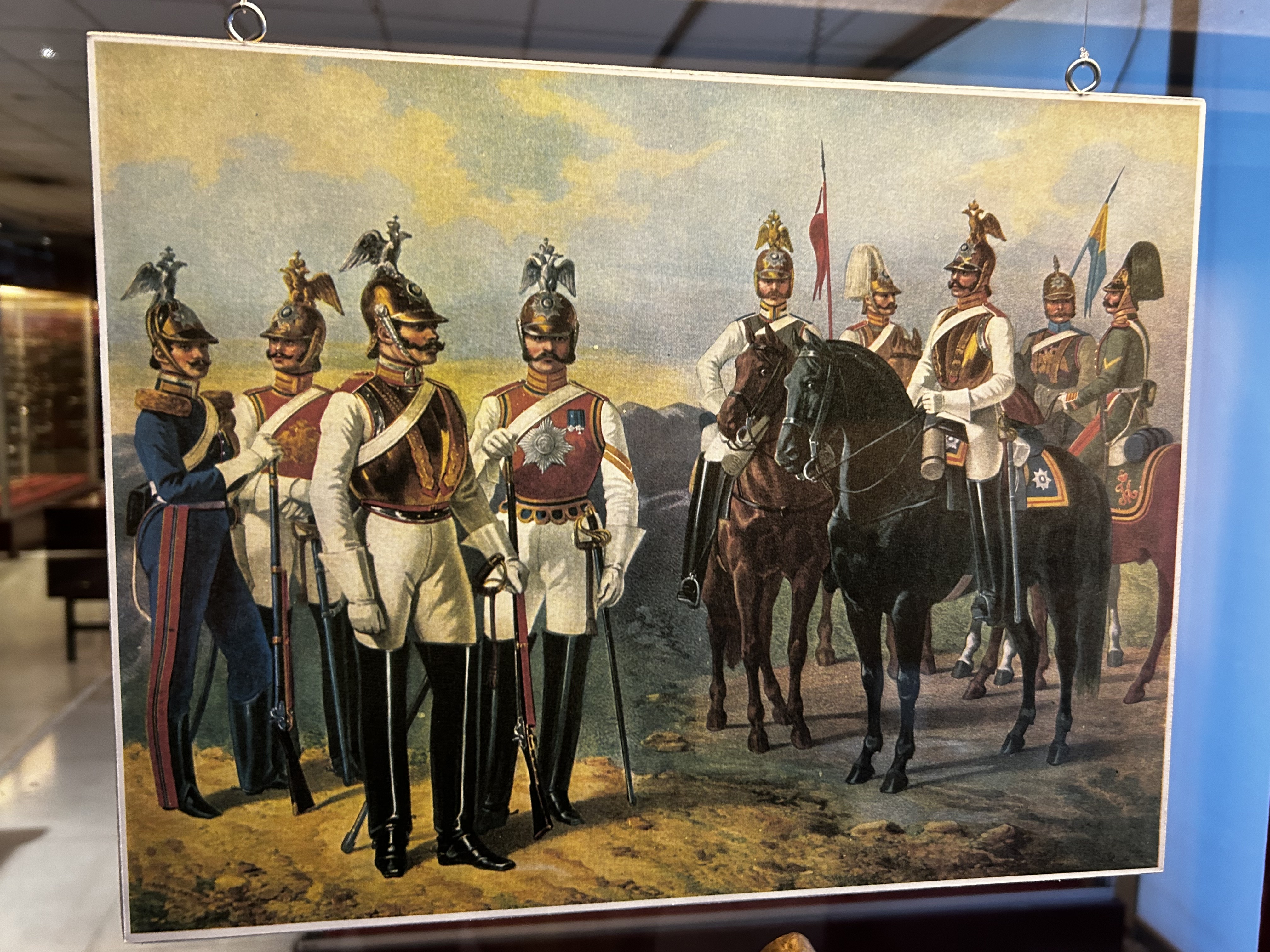 Picture of a picture of napoleons men wearing such a helmet